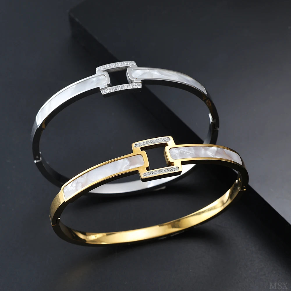 White shell cuff bracelet for women with square crystal detail