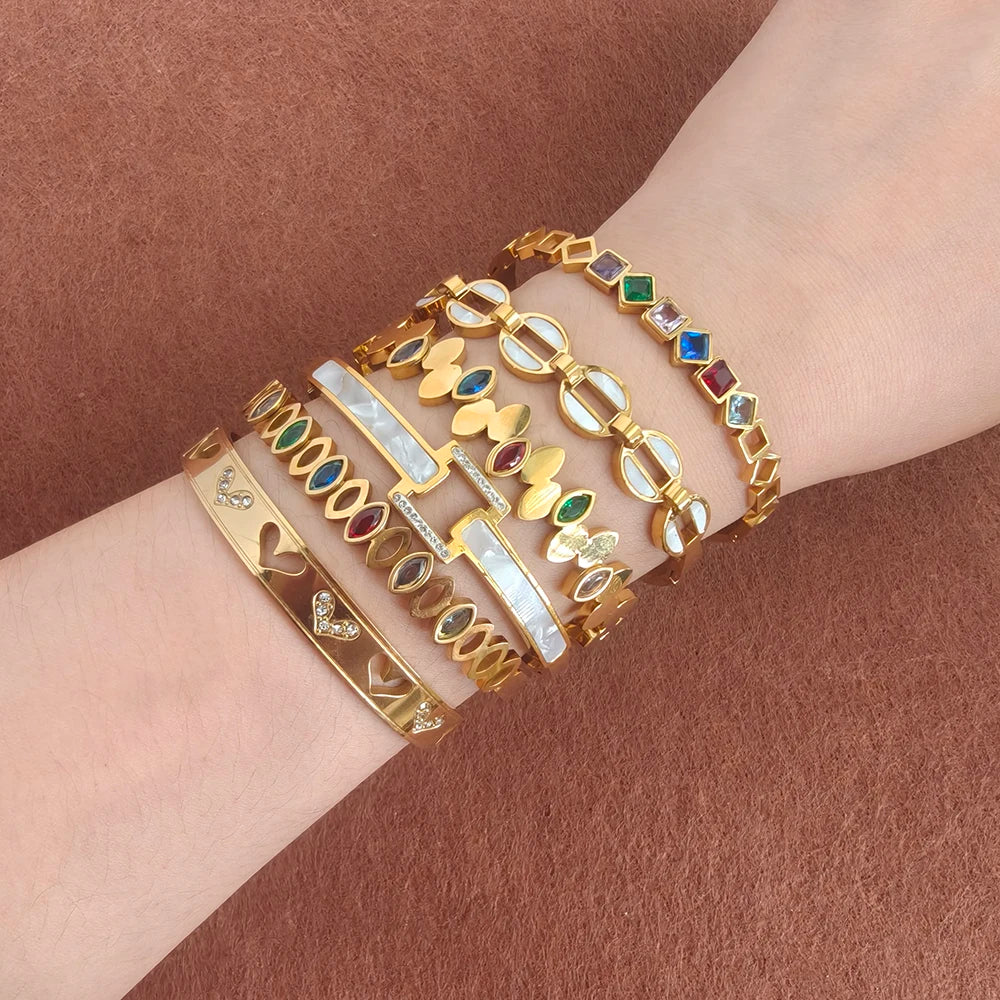 White shell cuff bracelet worn on wrist