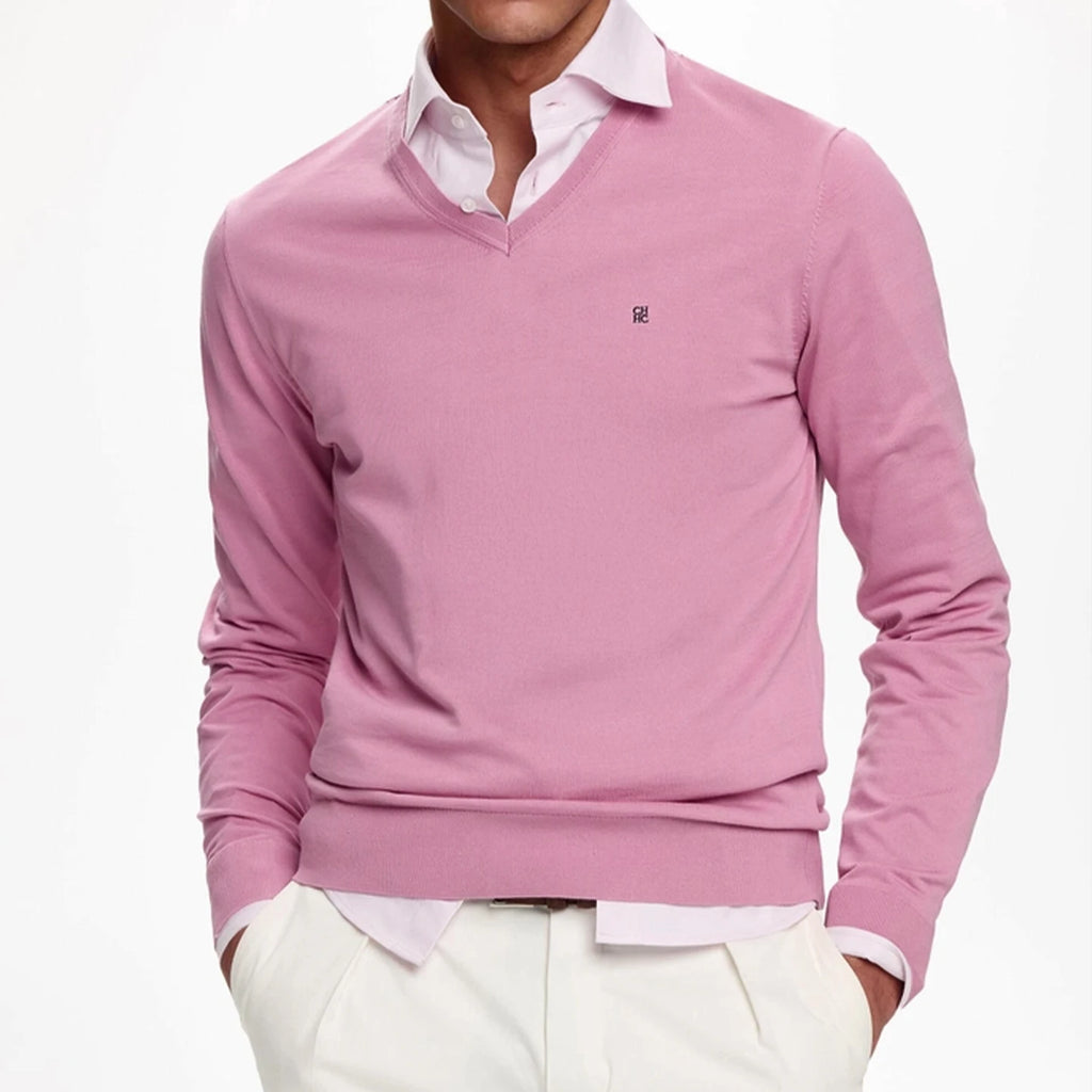 Men's Embroidered V-Neck Knit Sweater in pink, layered over a white shirt, showcasing polished comfort for everyday wear.